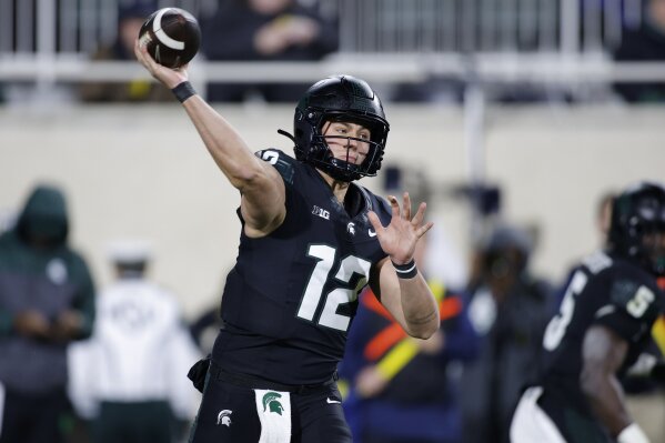 McCarthy throws 3 TD passes in 1st half No. 2 Michigan routs